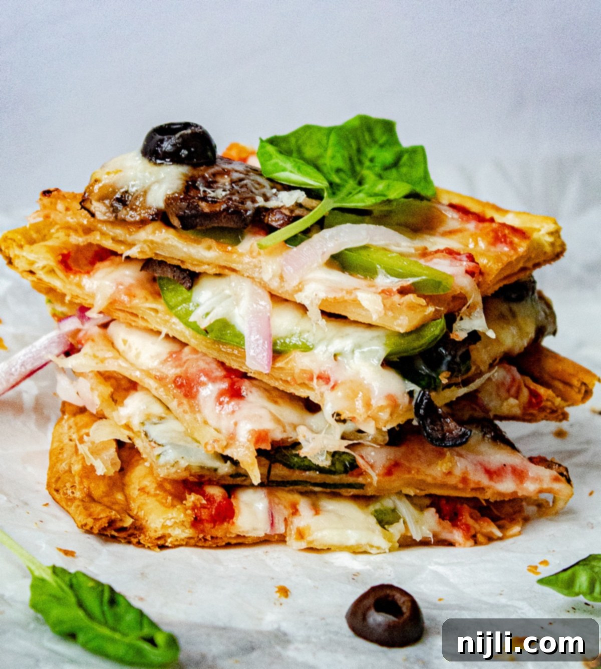 Flaky Pizza Creation 7 puff pastry pizza slices stacked