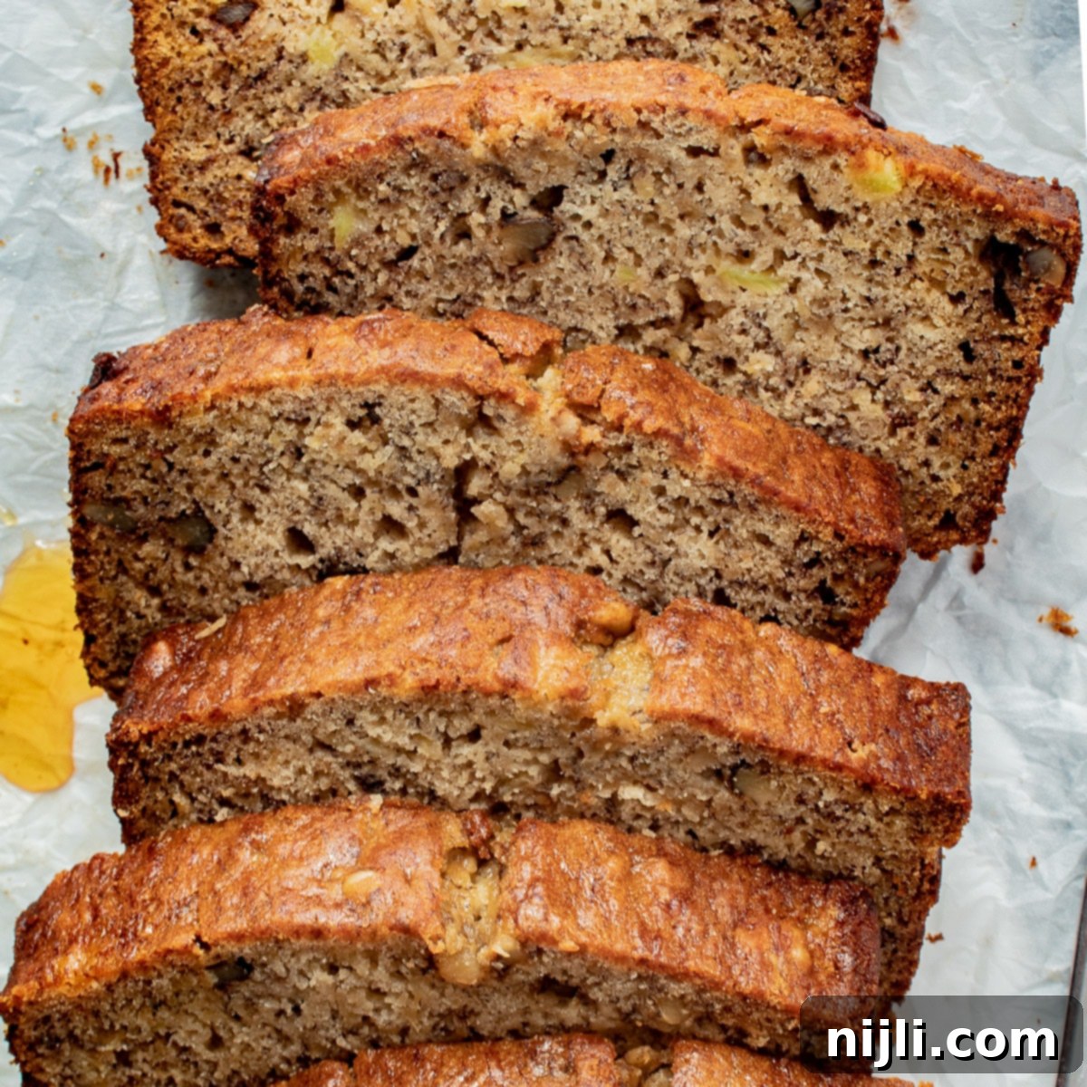 Tropical Pineapple Banana Bread 8 stacked pineapple banana bread seen from above
