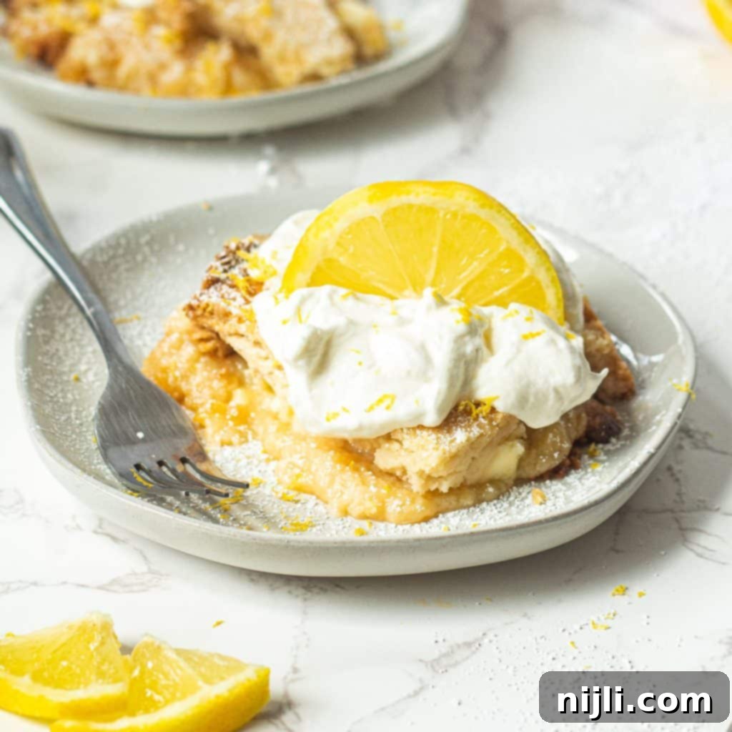 Lemon Cloud Delight 2 lemon dump cake on a plate