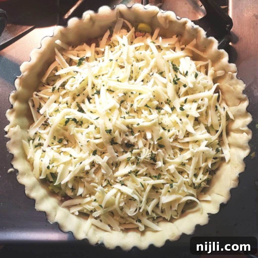 Decadent Bacon, Gruyère, Leek and Asparagus Quiche 8 Unbaked quiche filling with bacon, leeks, asparagus, and cheese | Chenée Today